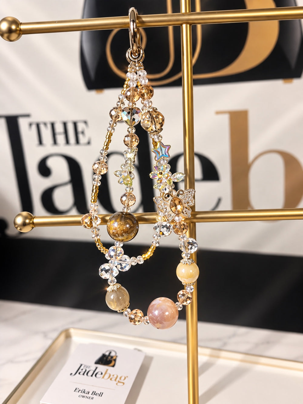 The JadeBags Champagne Butterfly Crystal Charm