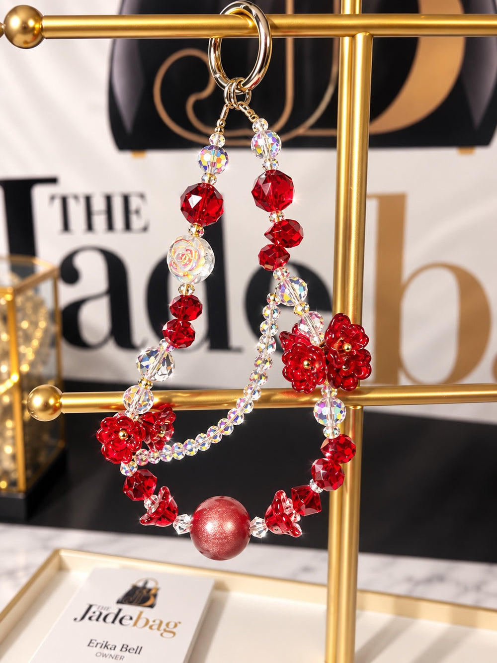 The JadeBags Red Crystal Floral Charm