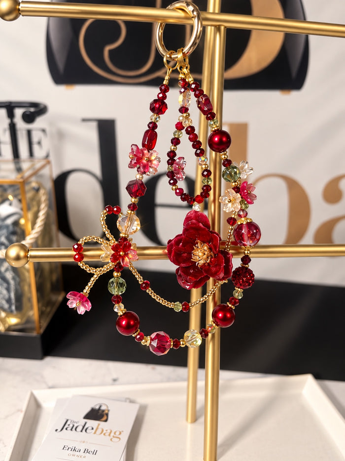 The JadeBags Red Floral Crystal Charm